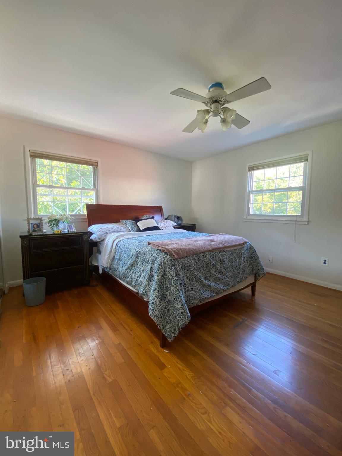 9601 East Light Drive Silver Spring, MD 20903 - Photo 12 of 25 a bedroom with a bed and window