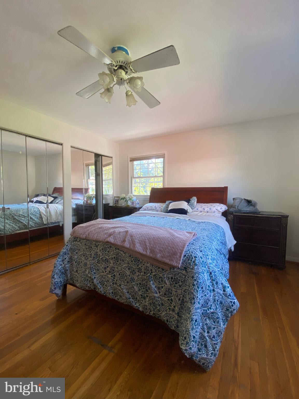 9601 East Light Drive Silver Spring, MD 20903 - Photo 13 of 25 a bedroom with a bed and window