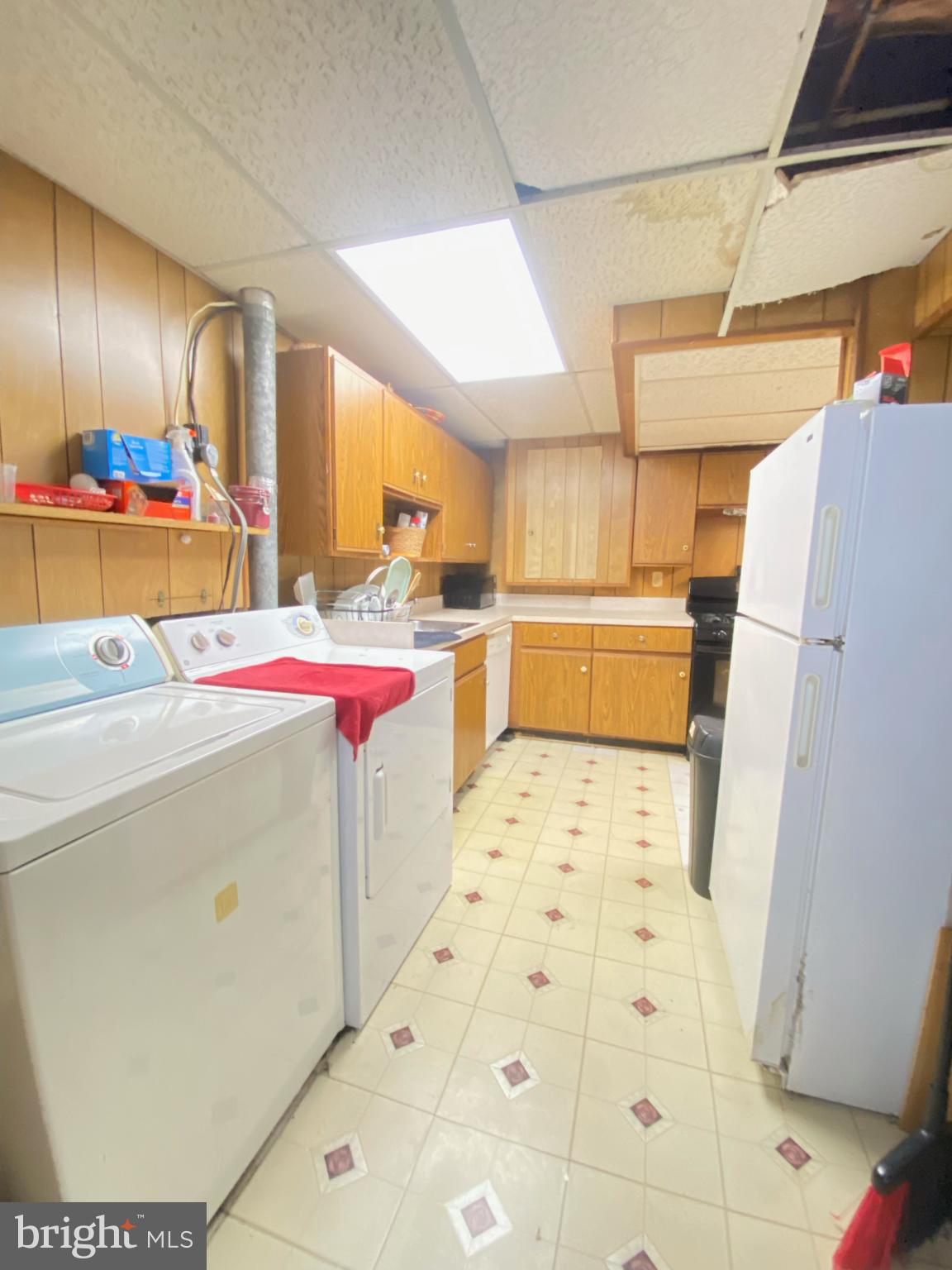 9601 East Light Drive Silver Spring, MD 20903 - Photo 21 of 25 a storage room with washer and dryer