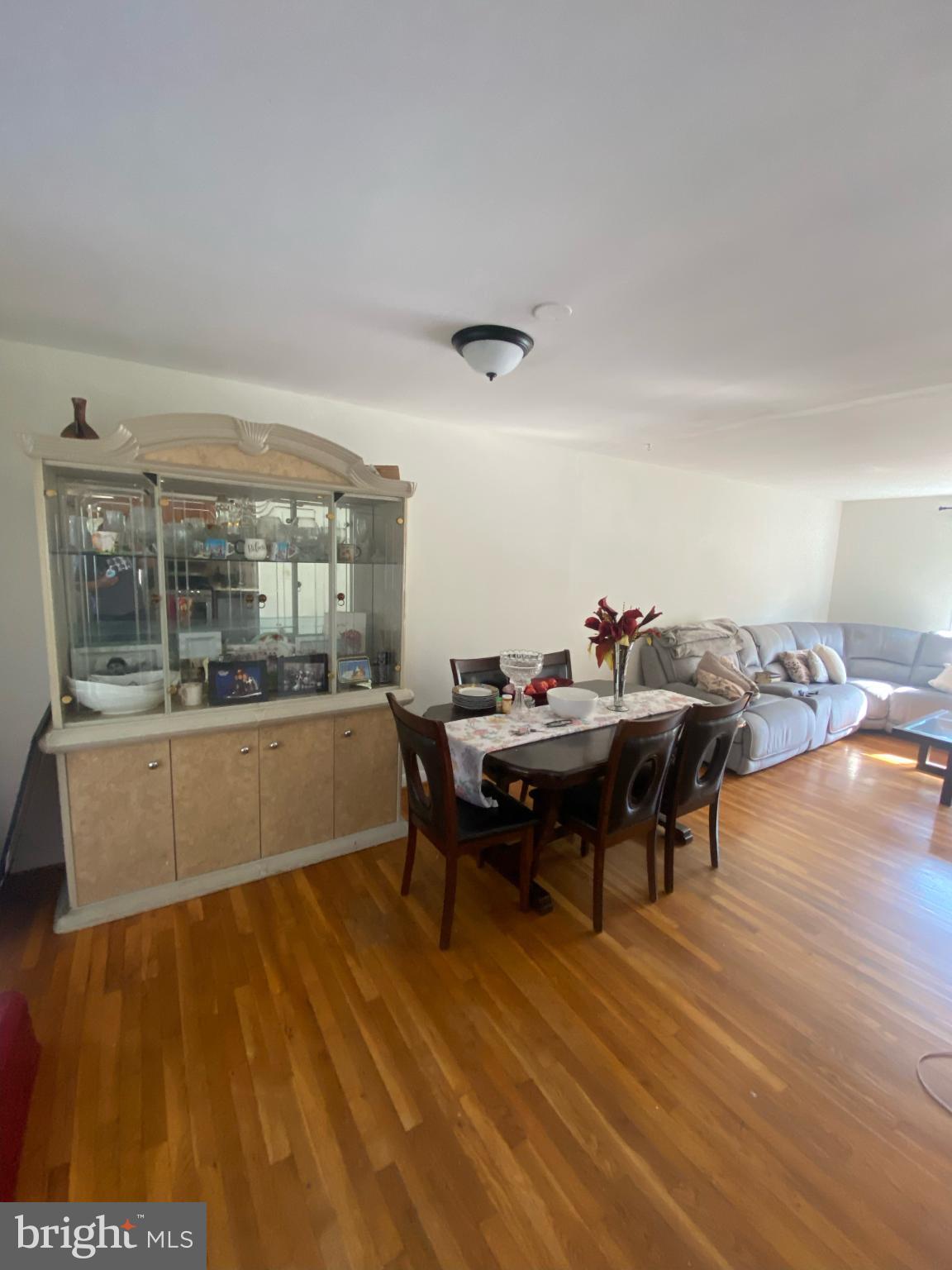 9601 East Light Drive Silver Spring, MD 20903 - Photo 5 of 25 a view of a workspace with furniture window and wooden floor