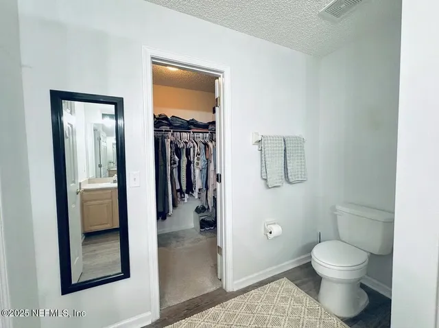 a bathroom with a sink double vanity and a mirror