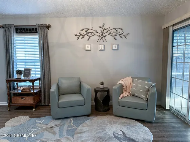 a living room with a couch and a table
