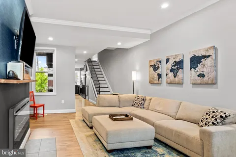 a living room with furniture and a couch