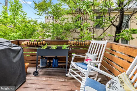 an outdoor view of patio with seating area
