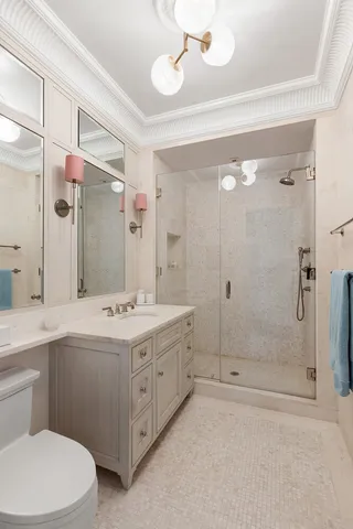 a living room with furniture a rug and a window