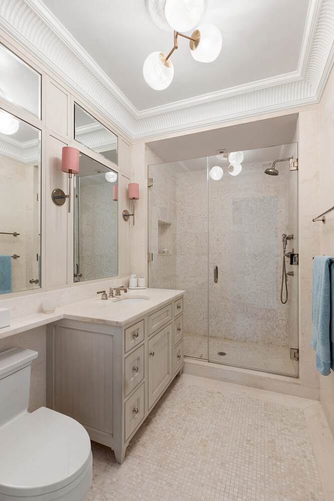 390 West End Avenue, Unit 3L Manhattan, NY 10024 - Photo 14 of 18 a bathroom with a sink a toilet and shower