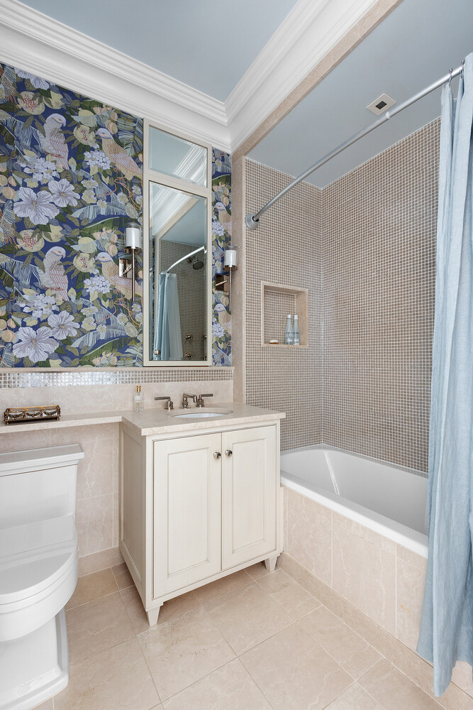 390 West End Avenue, Unit 3L Manhattan, NY 10024 - Photo 17 of 18 a bathroom with a bathtub sink and mirror
