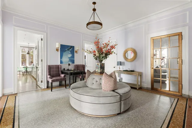 a workspace with furniture and a window