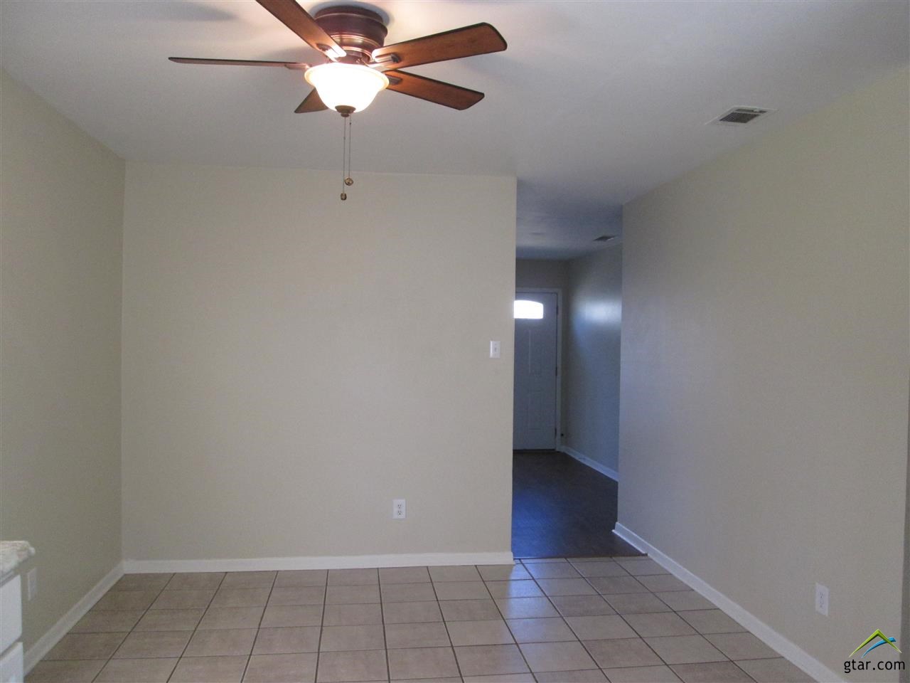 2409 Mimosa Drive Tyler, TX 75701 - Photo 11 of 35 a view of an empty room with a fan
