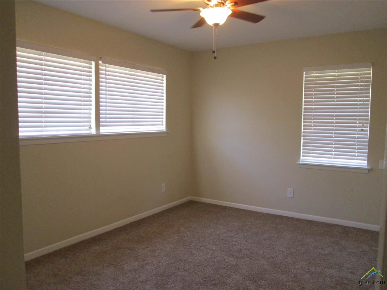 2409 Mimosa Drive Tyler, TX 75701 - Photo 26 of 35 an empty room with a window