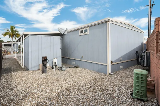 a bedroom with a door and a shower