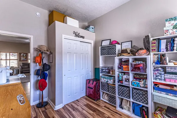 a room with bookshelf and a book shelf
