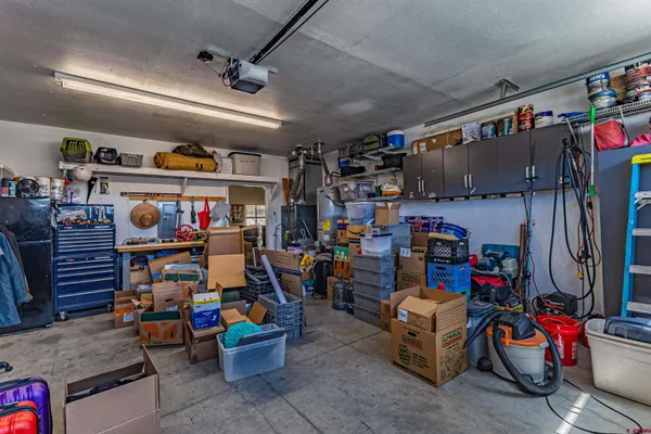 a room with lots of storage and a utility