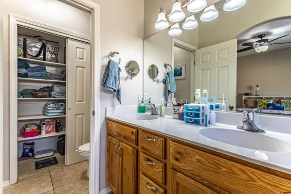 a bathroom with a sink a vanity and a mirror