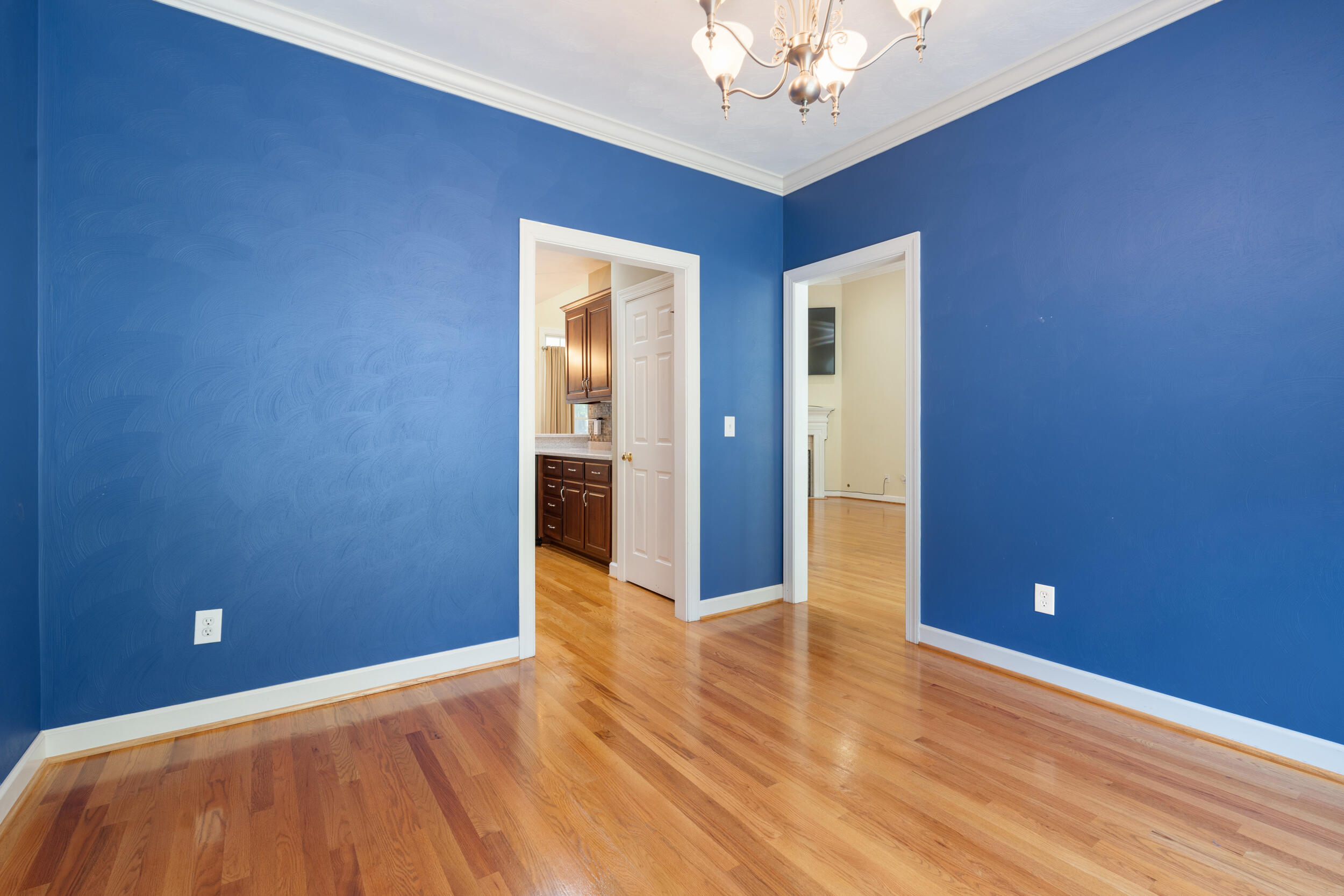 4731 Goodman Road Roanoke, VA 24014 - Photo 17 of 47 a view of an empty room with wooden floor