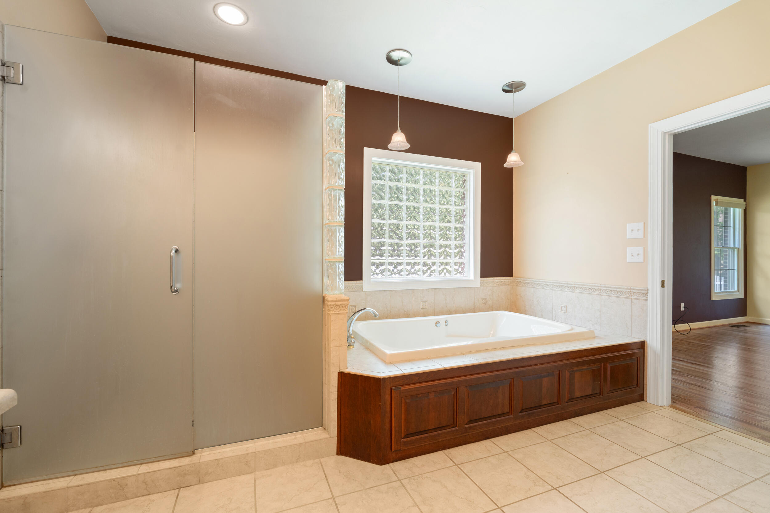 4731 Goodman Road Roanoke, VA 24014 - Photo 24 of 47 a bathroom with a bathtub and shower