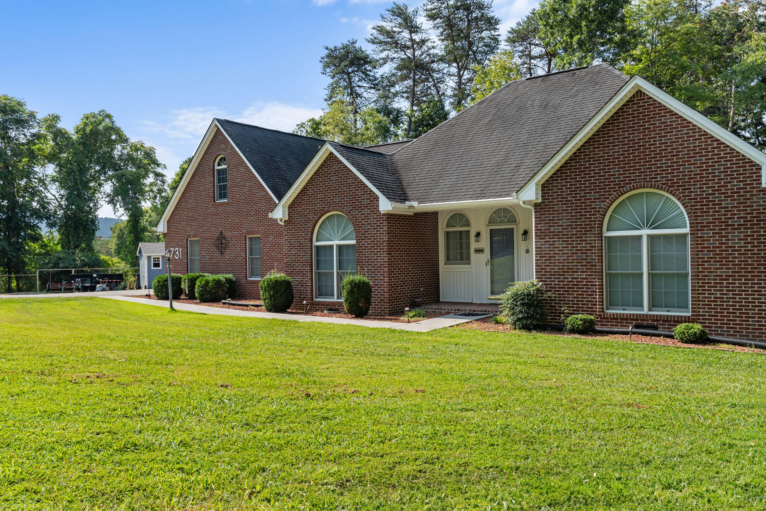 4731 Goodman Road Roanoke, VA 24014 - Photo 39 of 47 a front view of a house with yard and green space