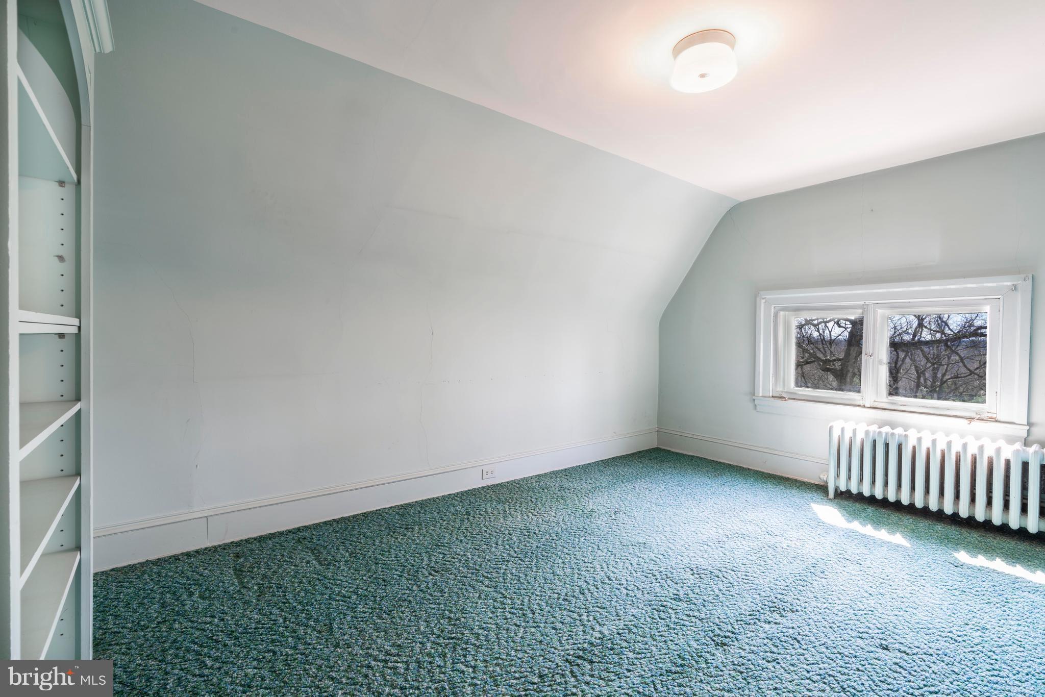 4005 Old Court Road Baltimore, MD 21208 - Photo 22 of 26 5th Bedroom with built in shelves + walk-in closet