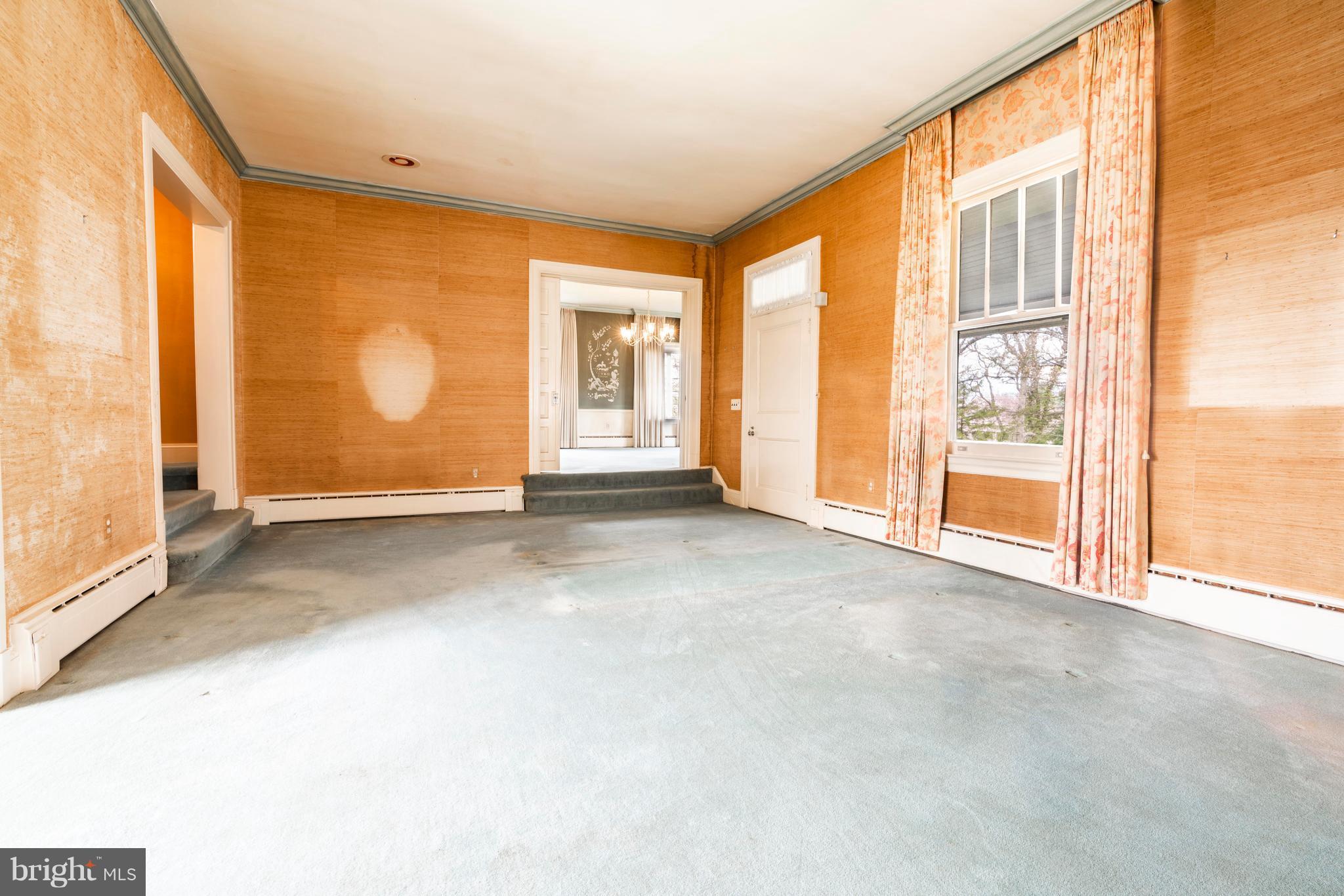 4005 Old Court Road Baltimore, MD 21208 - Photo 10 of 26 Living Room with front entry and wrap around porch