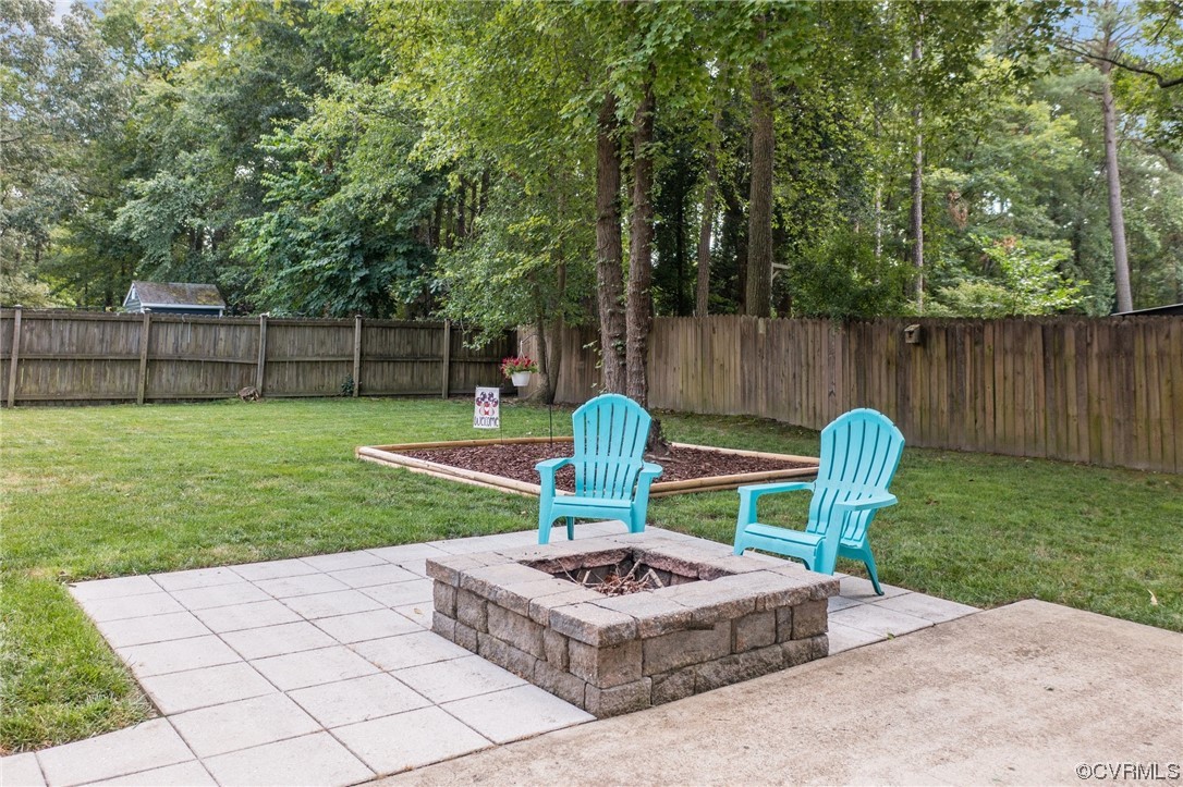 4513 Brookridge Road Chesterfield, VA 23832 - Photo 2 of 50 a view of a chair and table in the garden