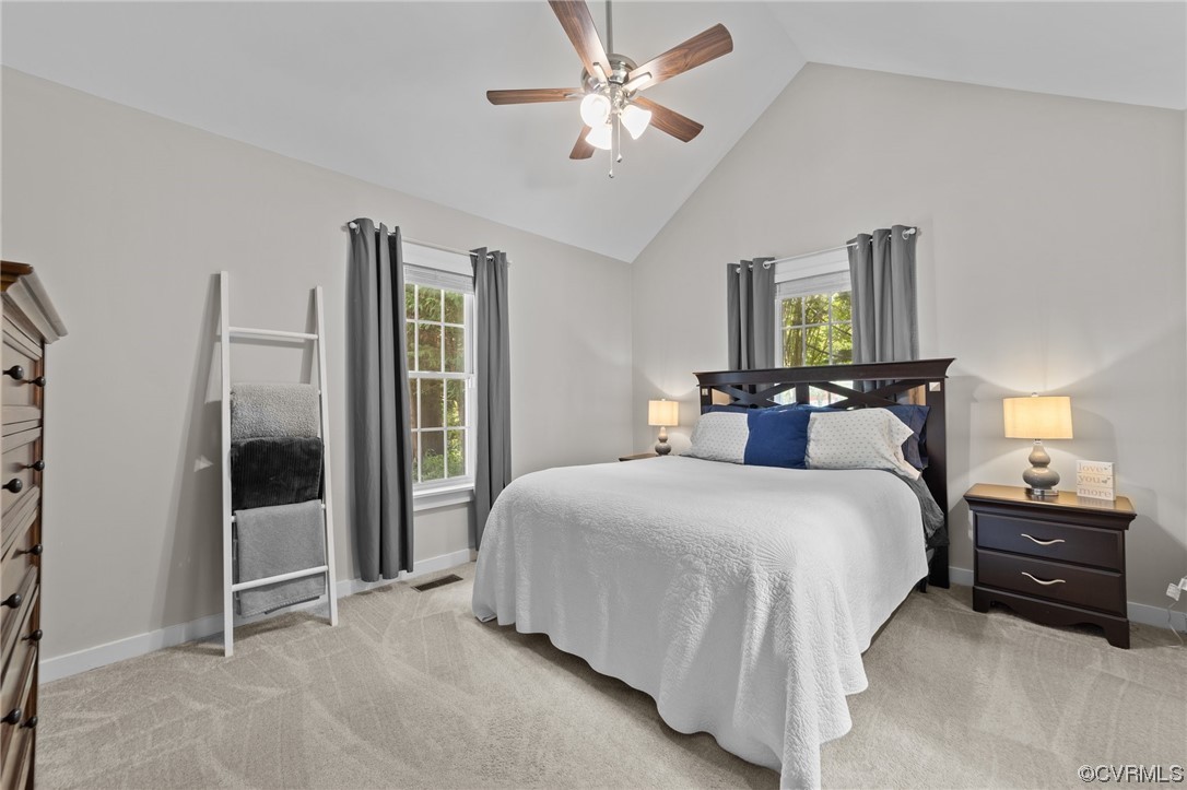 4513 Brookridge Road Chesterfield, VA 23832 - Photo 28 of 50 a bedroom with a bed and a chandelier