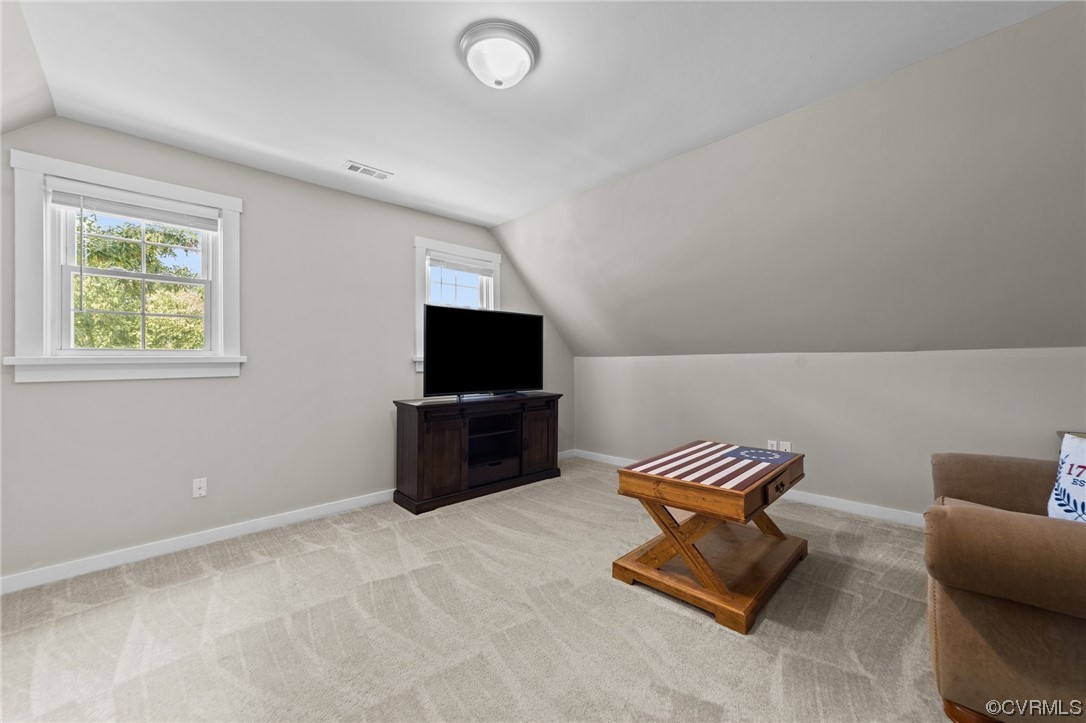 4513 Brookridge Road Chesterfield, VA 23832 - Photo 32 of 50 a living room with furniture and a flat screen tv