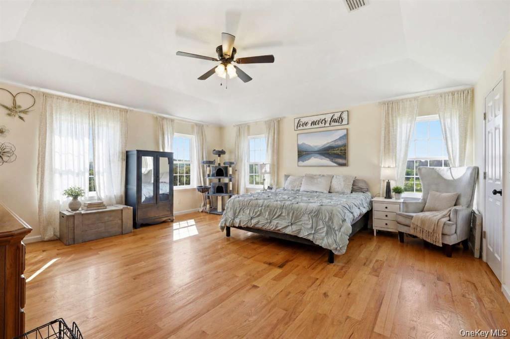 133 Old Chester Road Goshen, NY 10924 - Photo 16 of 33 a spacious bedroom with a bed and furniture