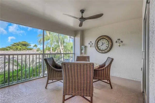 a view of a chairs and a table in a room