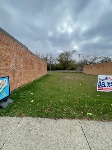 a view of a street with an outdoor space
