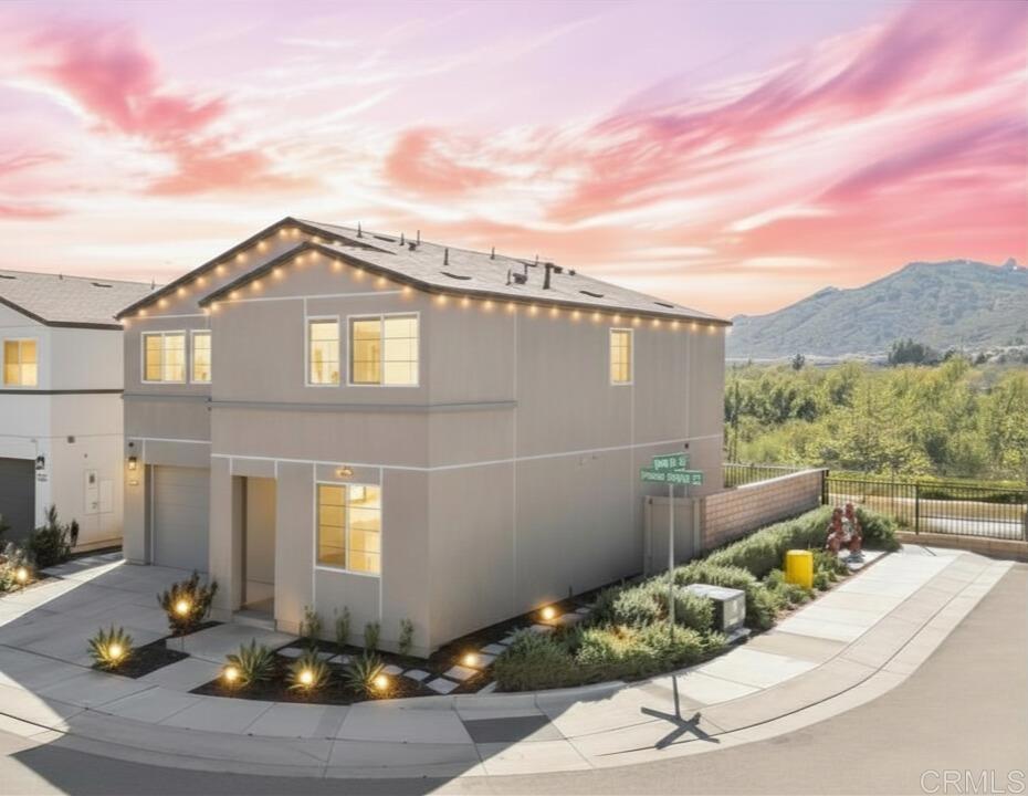 35076 Hacienda Heights Fallbrook, CA 92028 - Photo 26 of 32 a front view of a house with a yard