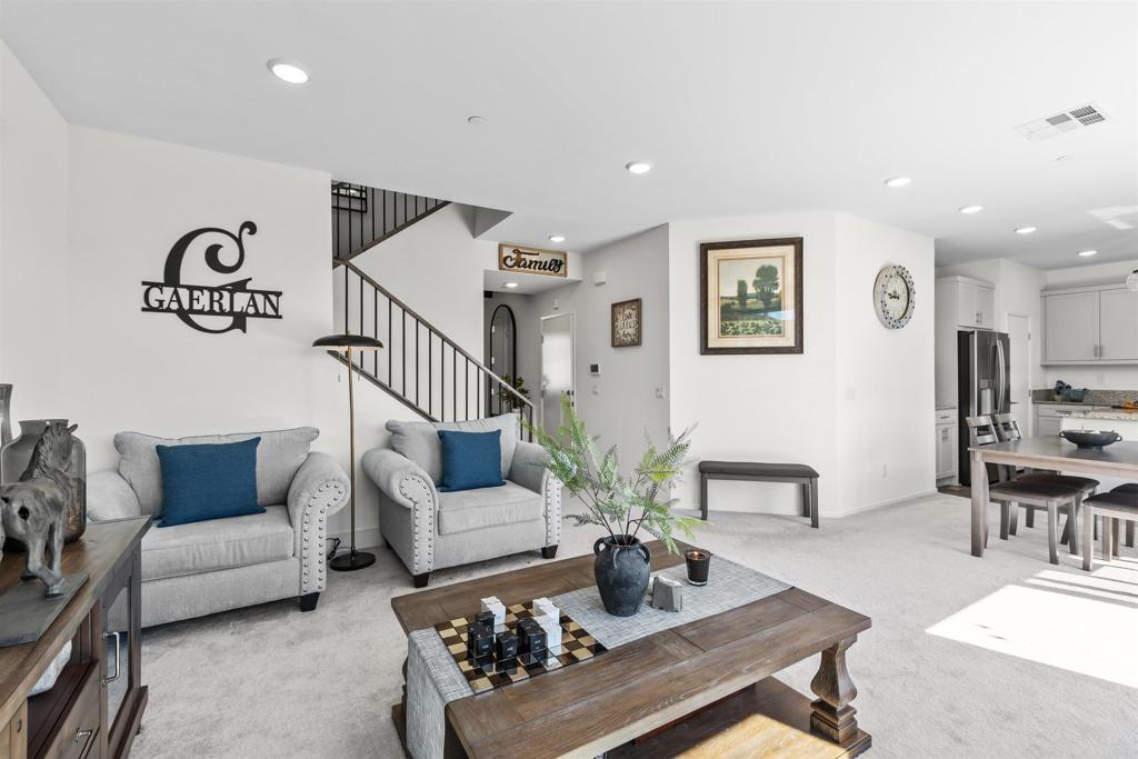 35076 Hacienda Heights Fallbrook, CA 92028 - Photo 5 of 32 a living room with furniture a rug and a table
