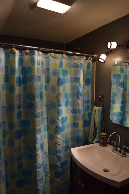 1572 Main Road Granville, MA 01034 - Photo 20 of 26 a bathroom with a sink and a mirror