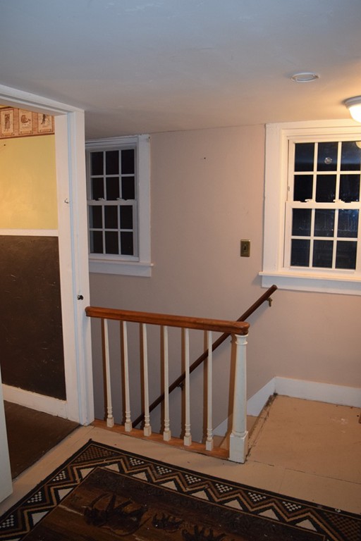 1572 Main Road Granville, MA 01034 - Photo 26 of 26 a view of a porch with wooden floor and a window