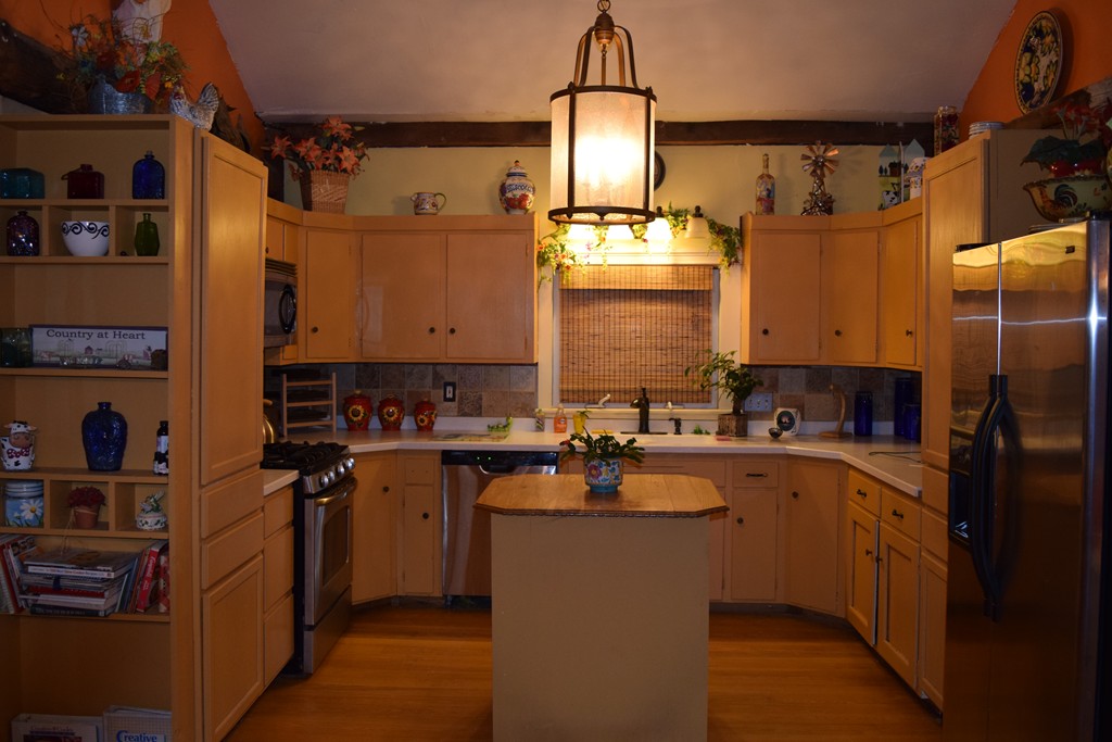 1572 Main Road Granville, MA 01034 - Photo 9 of 26 a kitchen with cabinets a sink and appliances