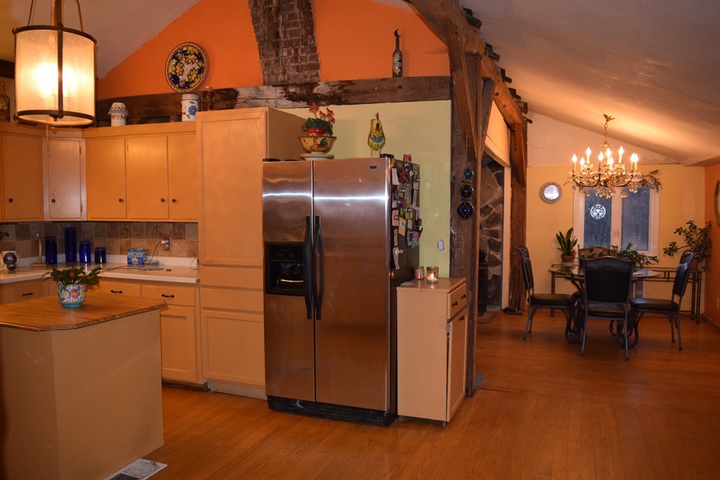 1572 Main Road Granville, MA 01034 - Photo 10 of 26 a kitchen with stainless steel appliances granite countertop a refrigerator and a stove