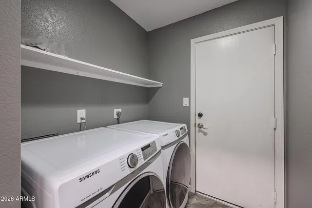 a view of a backyard of the house