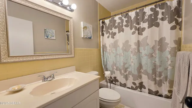 a view of a chairs and table in patio with a swimming pool