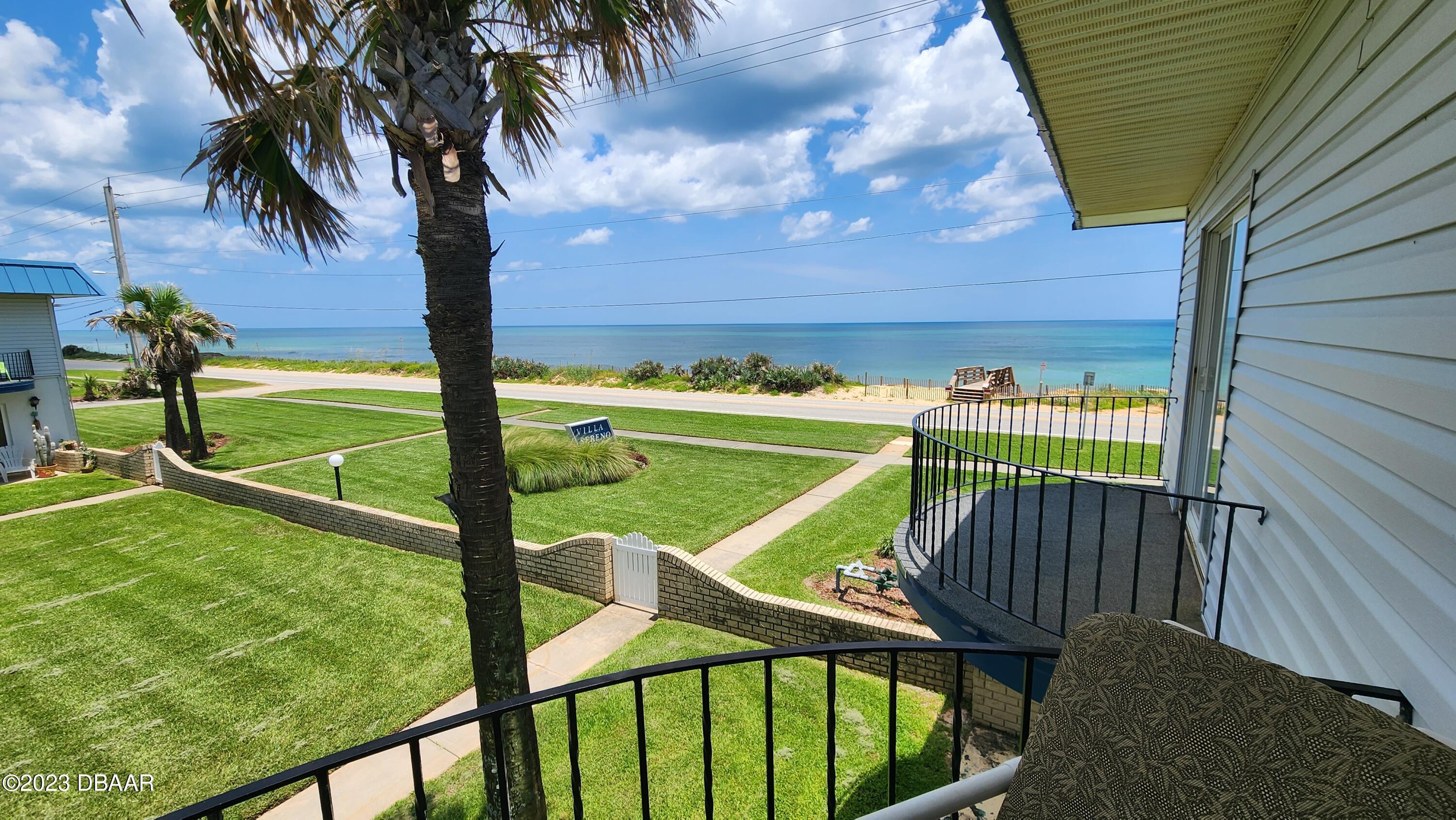 2750 Ocean Shore Boulevard, Unit 8 Ormond Beach, FL 32176 - Photo 28 of 60 a view of an outdoor space and swimming pool