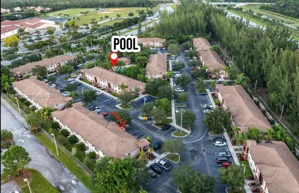 an aerial view of a house with a garden