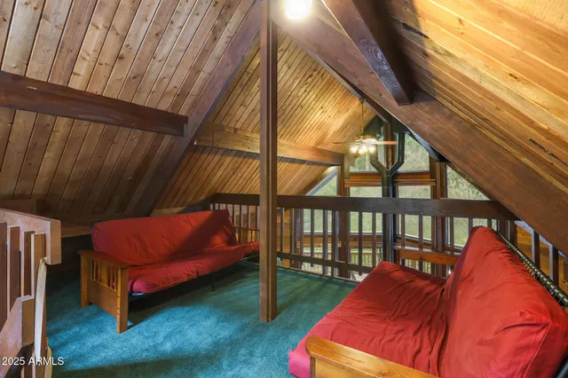 a backyard of a house with outdoor seating