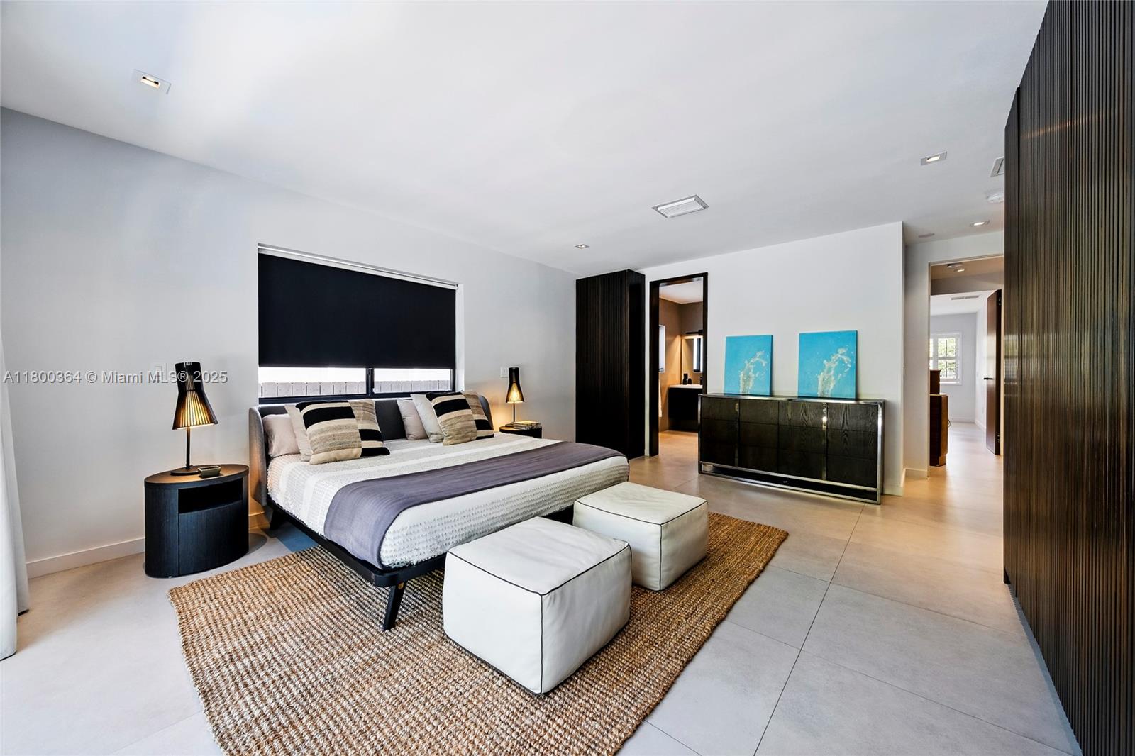 4275 Prairie Avenue Miami Beach, FL 33140 - Photo 32 of 61 a bedroom with bed and a flat screen television
