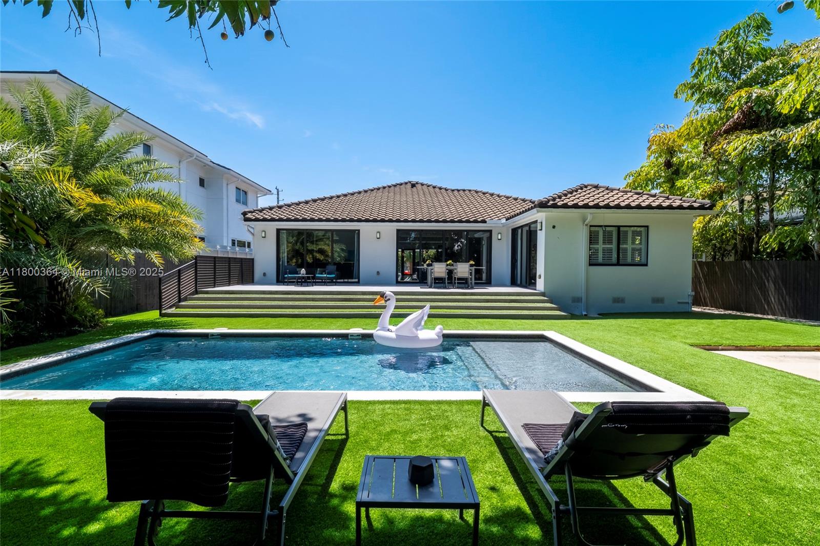 4275 Prairie Avenue Miami Beach, FL 33140 - Photo 40 of 61 a view of pool with an outdoor seating