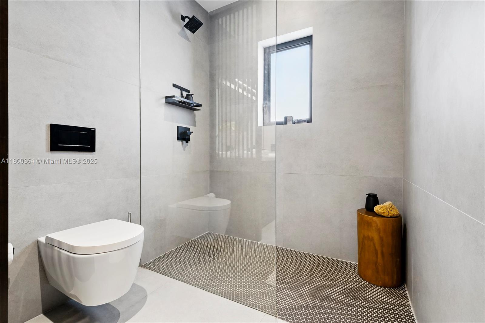 4275 Prairie Avenue Miami Beach, FL 33140 - Photo 47 of 61 a bathroom with a toilet and a shower
