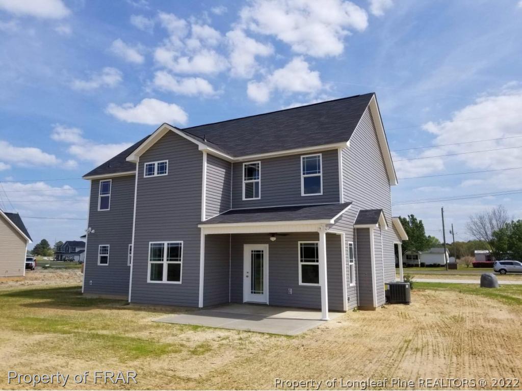 3627 Thrower Road Hope Mills, NC 28348 - Photo 35 of 35 a front view of a house with a yard