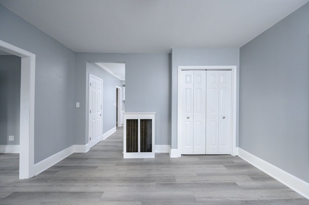 485 Temple Street Whitman, MA 02382 - Photo 15 of 34 a view of an empty room with wooden floor