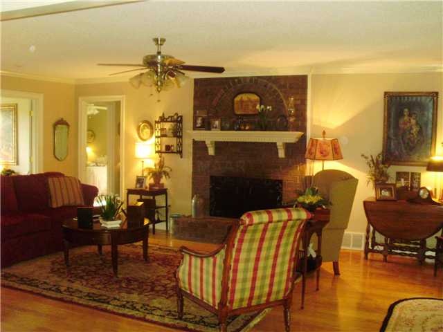 730 Stewart Road Eads, TN 38028 - Photo 2 of 12 Spacious Greatroom with beautiful Hardwood Floors, enjoy burning real wood in fireplace( also has a gas line for gas logs), opens to all living spaces so great for entertaining.