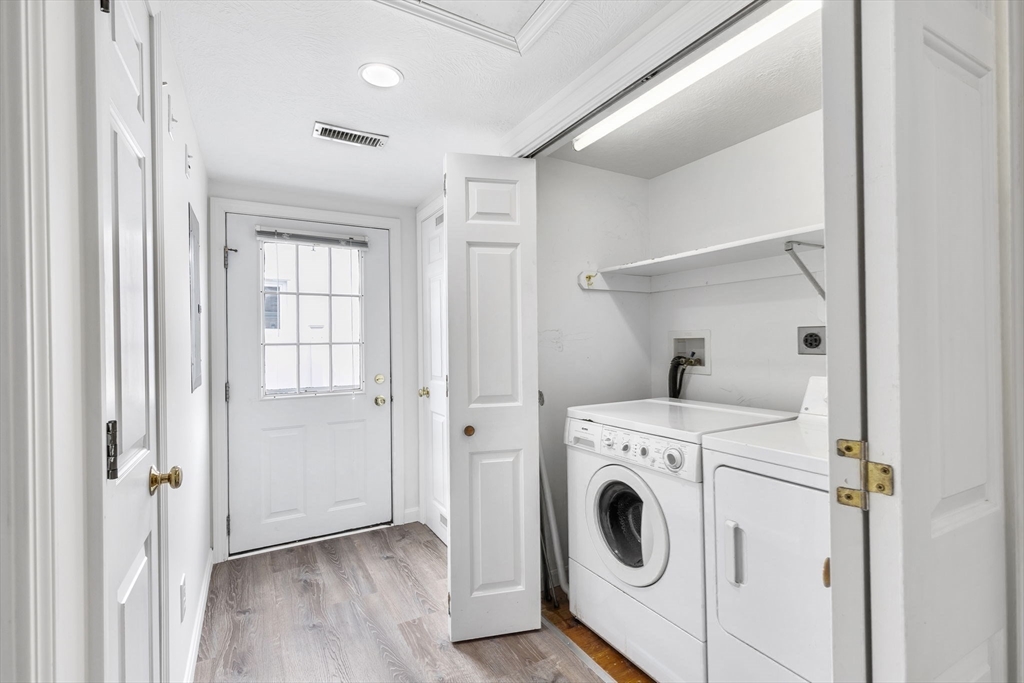 9 Foam Road Scituate, MA 02066 - Photo 13 of 19 a view of washer and dryer in a utility room