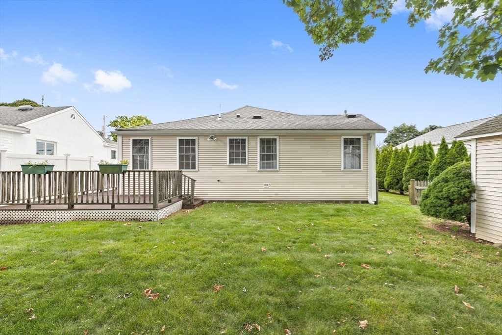 9 Foam Road Scituate, MA 02066 - Photo 16 of 19 a front view of a house with garden