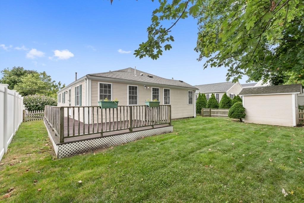 9 Foam Road Scituate, MA 02066 - Photo 17 of 19 a view of a house with a yard and deck