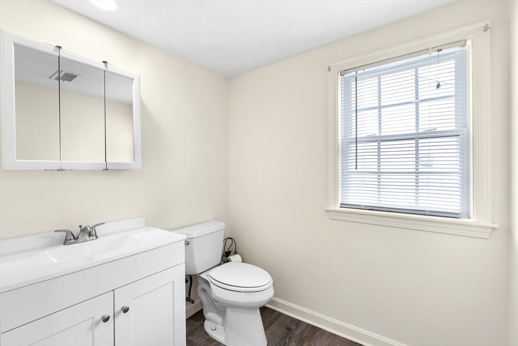 9 Foam Road Scituate, MA 02066 - Photo 9 of 19 a bathroom with a sink a toilet and a window